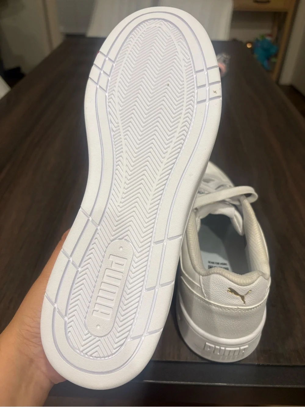 Puma White Low-Top Sneakers with Gold Logo